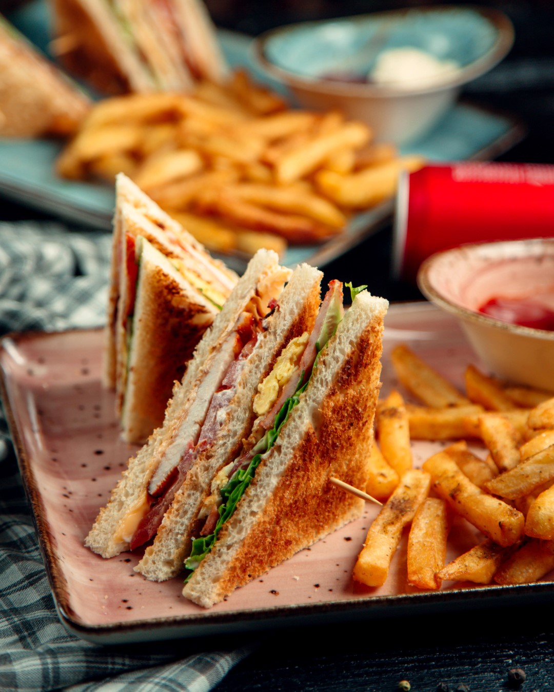 ham and omelette club sandwich and potatoes